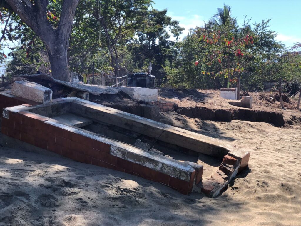 Graves Tumbling into the Sea at La Penita
